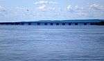 A long box girder bridge seen from several kilometers away.