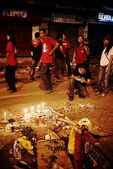 A makeshift shrine on the spot where a protester was shot