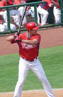 Pat Burrell standing at the plate holding a baseball bat