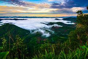 The sunrise seen from the top of Khao Thevada ("Angel Mountain"; 1,123 m, 3,684 ft)