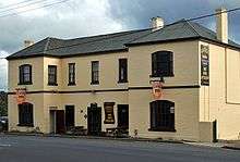 A yellow two-story building