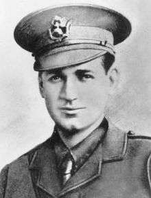 Formal head-and-shoulders portrait of a man in military uniform and cap.