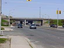 Cars on a wide roadway