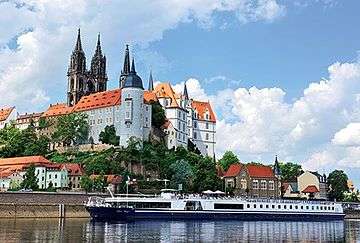 River Cruise Ship in European Town