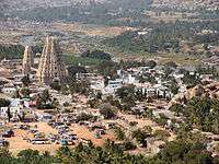 Aerial photo of triangular temple and surrounding buildings