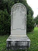 Old headstone with rounded top