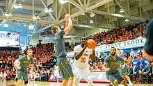 Jameel Warney (20) playing in the 2016 America East Tournament final against Vermont.