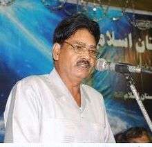 Kazim Jarwali reciting in Mushaira