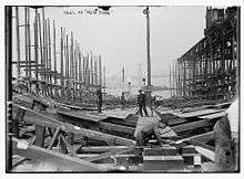 A shipyard where construction is beginning on a large ship