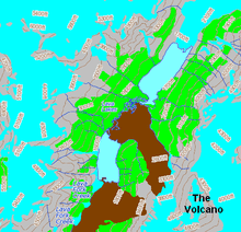 Overhead image of two lakes surrounded by vegetation and mountain ridges capped by glacial ice.