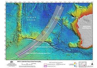 Bathymetric map of the southern Indian Ocean, west of Australia, overlaid with the 7th BTO arc, the wide area search, and the regions that the two vessels would search (located along the arc in the southern part of the wide area search)