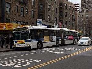 Articulated bus number 5604 in Q10 Limited service