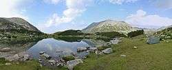 A glacial lake and a mountain summit