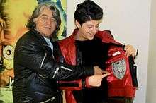 Designer Marc Laurent presents Raffi Boghasian with a limited-edition, signed Michael Jackson Thriller jacket.