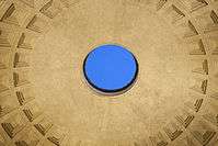 Close interior photo of the Pantheon's circular oculus opening at the center of the domed ceiling