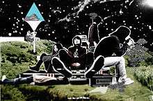 A cut-out picture of Sakanaction's band-members places in a landscape of grassy hills and black sky.