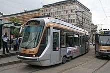 A photograph of a Bombardier T2000 tram at Houba de Strooper tram stop.