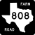 Image of FM 808 highway shield. The square shield has a white symbol in the shape of Texas as the state appears on maps on a black background. Inside this symbol is the number 808. The black background contains the word FARM in the upper right corner and the word ROAD in the lower left corner.