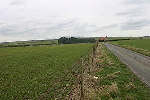 View of farm buildings and agricultural fields in Thwing and Octon parish