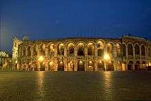 The outside of a stone amphitheater.