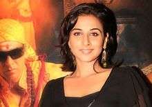 Vidya Balan is looking directly at the camera.