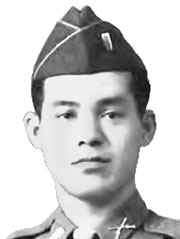 Head of a man wearing a garrison cap and a tie and shirt with a crossed-rifles pin on the collar.