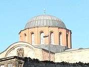 Exterior of a dome at Zeyrek Mosque showing exposed external dome profile and buttressed windows in a drum