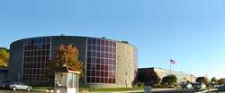 An auditorium and school buildings